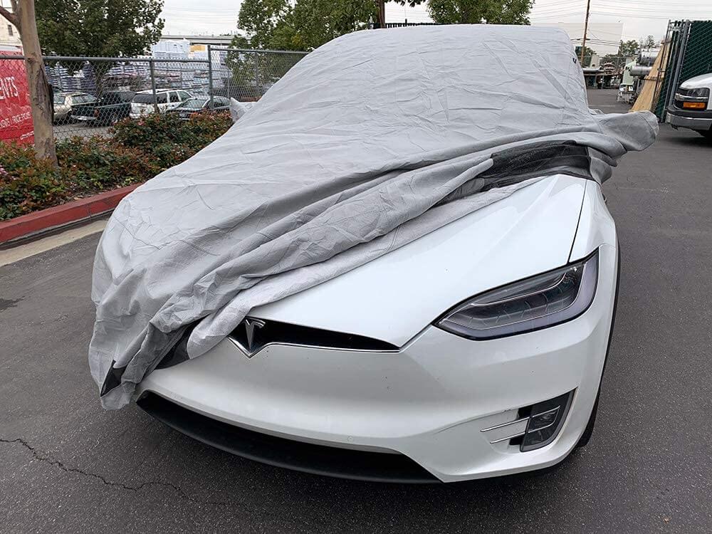 https://engineersbible.com/wp-content/uploads/2023/02/Car_Cover_Tesla_Owner.jpg